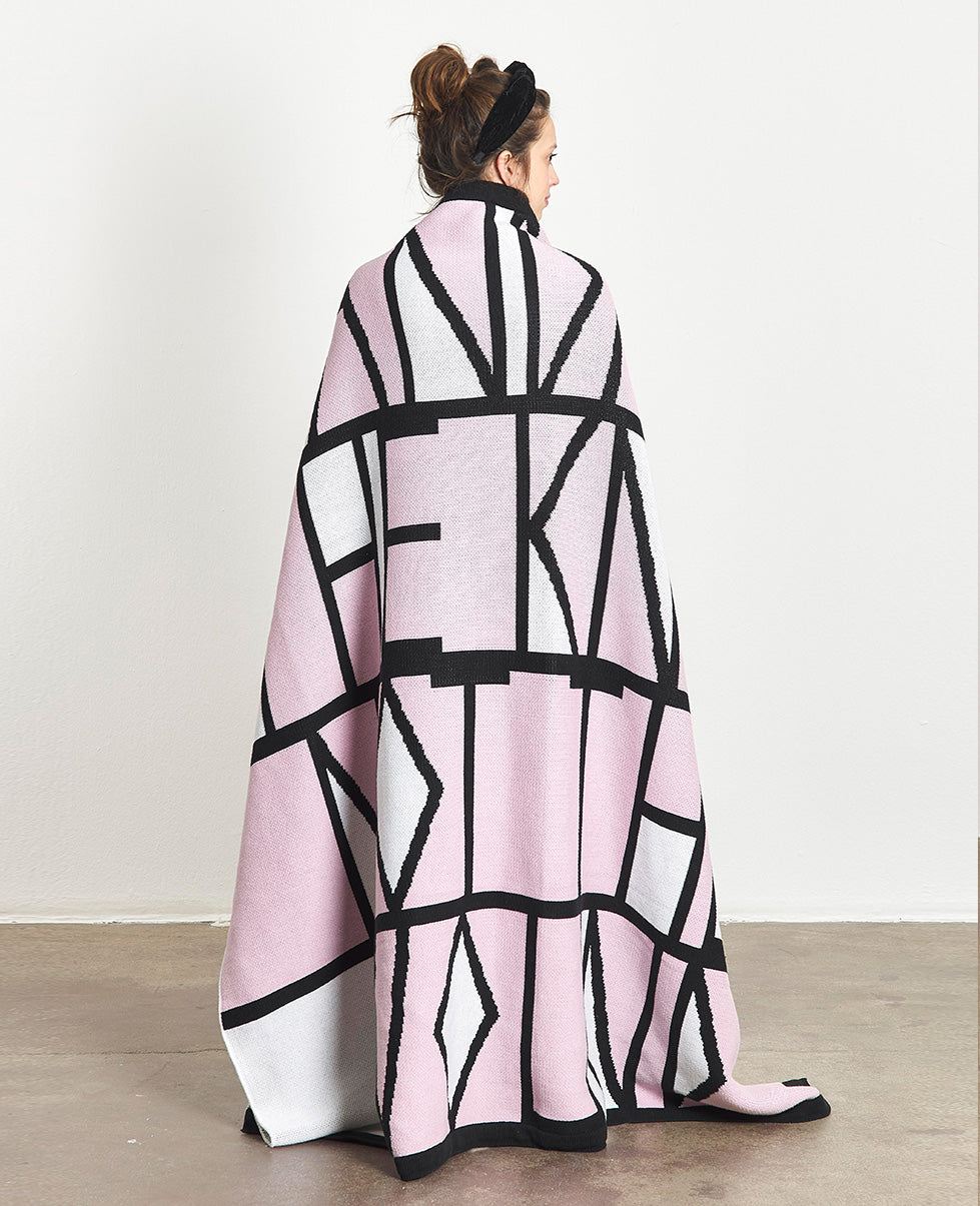 Limited edition of 50 artist blanket for sale. Broomberg & Chanarin Artist-Inspired Gift. Woman wearing the blanket