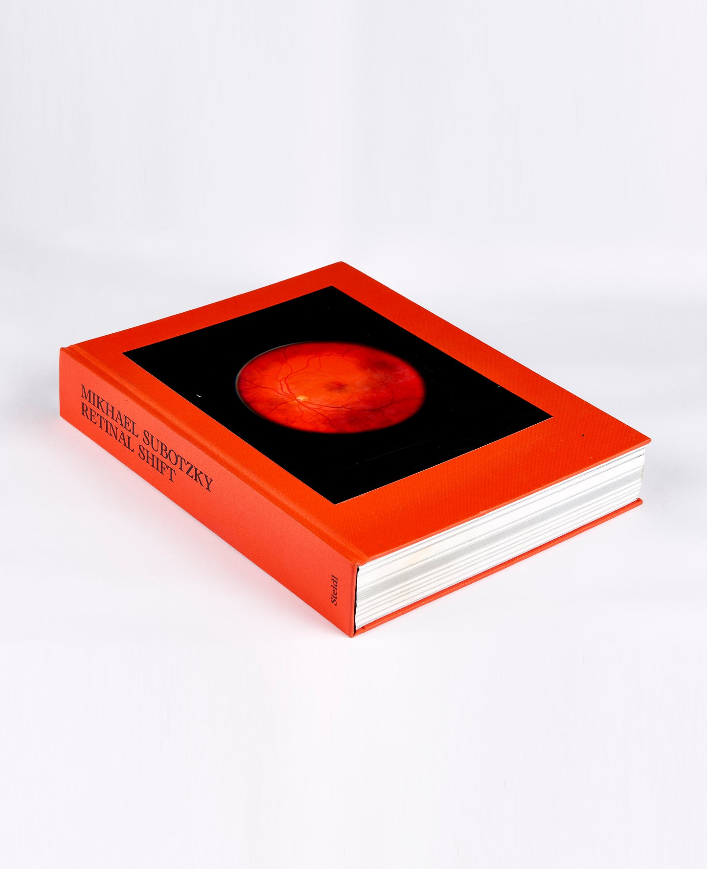 'Retinal Shift' is a first retrospective of Subotzky’s work. He investigates the practice and mechanics of looking, in relation to the history of Grahamstown, the history of photographic devices, and Subotzky’s own history as an artist. The book fuses his compelling and sometimes brutal photography with essays and archived portraits from the last century to create an intricate and esoteric collection.
